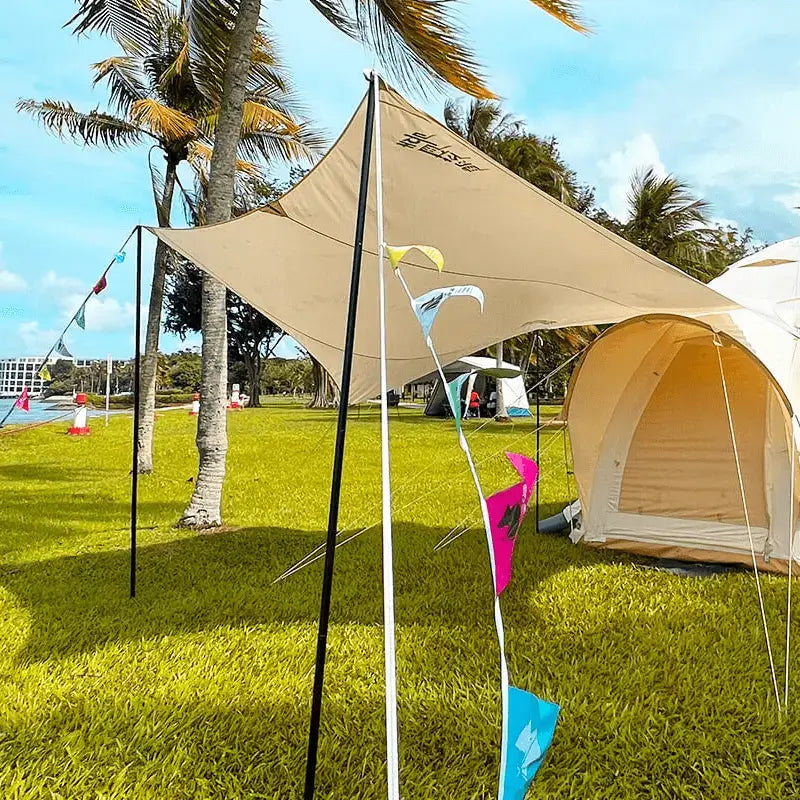 Elegant front canopy extending from a Premiere Sphere tent, enhancing tent, camp, and glamp rental experiences.