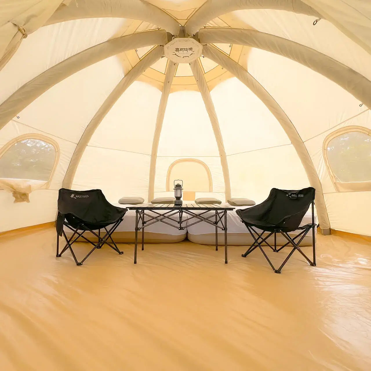 Premiere Sphere tent camp rental for glamping with inflatable bed add-on